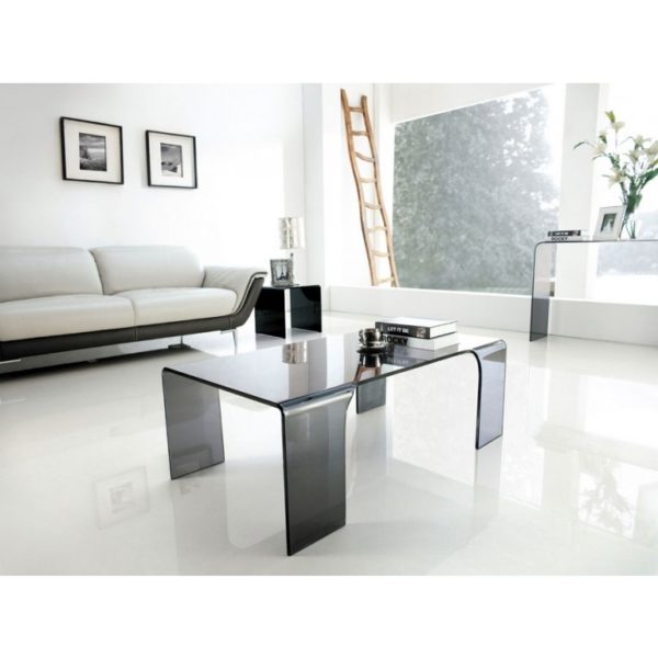 Large smoked glass coffee table on four legs